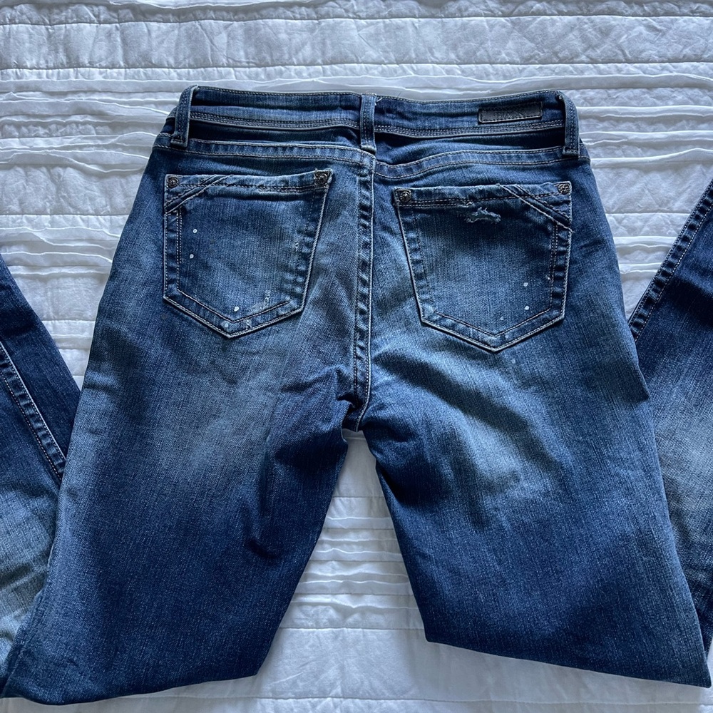 Buckle black distressed jeans 25x32